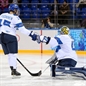 SOCHI, RUSSIA - FEBRUARY 10: Finland's Minttu Tumominen #15 fist-pump goaltender Noora Raty #41 prior to their game opposing Canada during women's preliminary round action at the Sochi 2014 Olympic Winter Games. (Photo by Andre Ringuette/HHOF-IIHF Images)

